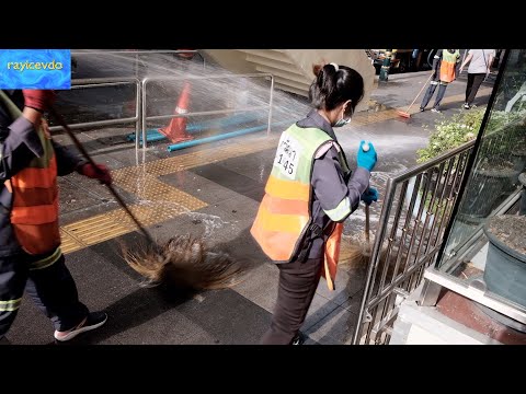 SIdewalk Washers Sukhumvit Road between Soi Nana and Soi Asoke Bangkok Thailand