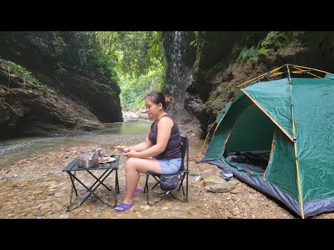 camping by the waterfall