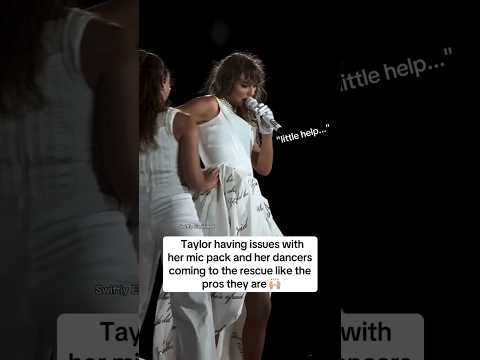 Taylor Swift struggling with her zipper and fixing her mic pack on stage... The errors tour...