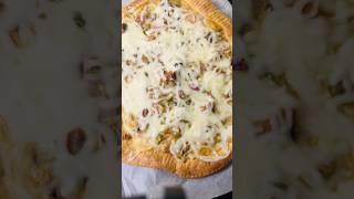 Learn to make creamy white pizza at home! Simple, delicious, and perfect for any meal!