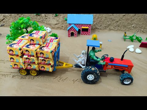 DIY Mini tractor transporting Parle-G biscuit and Road Repair science project| @Acrofter1