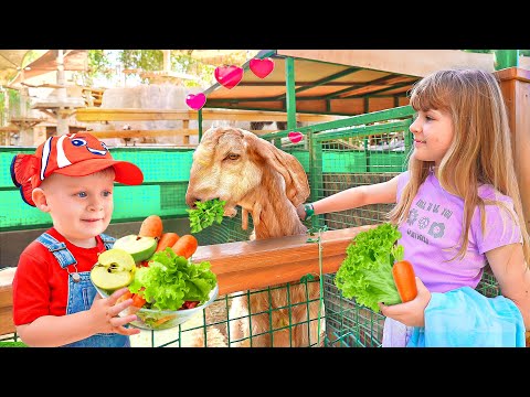 Diana Roma & Oliver feed the Animals at the Emirates Park Zoo