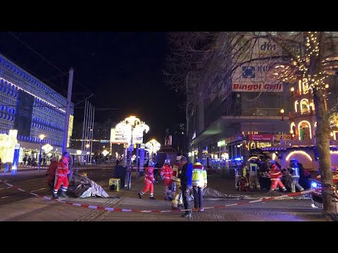 Multiple casualties after car drives into crowd at Christmas market in Germany