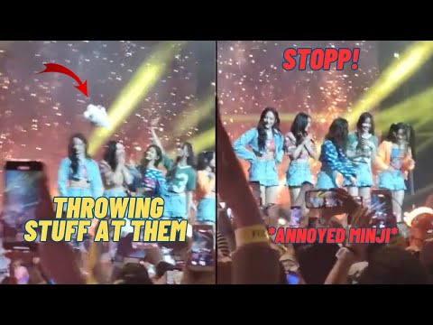 Minji’s *ANNOYED* reaction to fans throwing stuff on stage