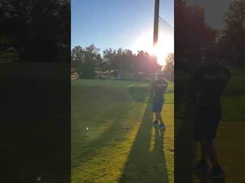 Hitting flops on a downhill lie #golf #shorts #short