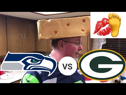 NFL Seahawks fan loses bet to Packers fan.  KISS MY FOOT! 💋🦶