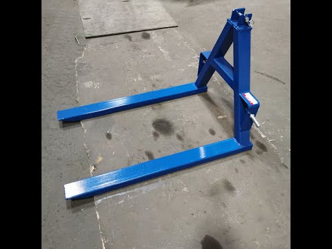 a useful and competitive pallet forks . with tractor three point hitch 2000lbs loading capacity