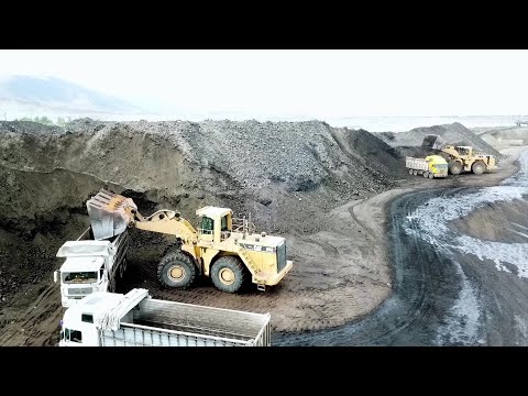 Two Caterpillar 990 Wheel Loaders Loading Trucks - Drone Video - Ektor Epe