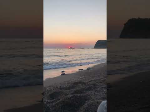 Beautiful sunset view at Buljarica beach in Montenegro filled with relaxing sounds of the sea.