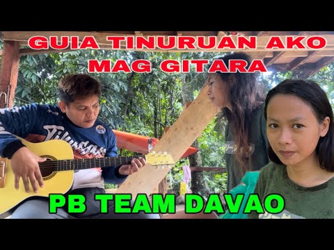 MANG ELI TINURUAN NI GUIA MAG-GITARA.