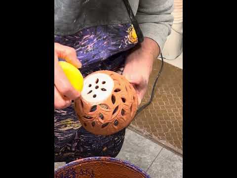 Glazing a small berry bowl with Coyote’s Dragon Eye glaze.