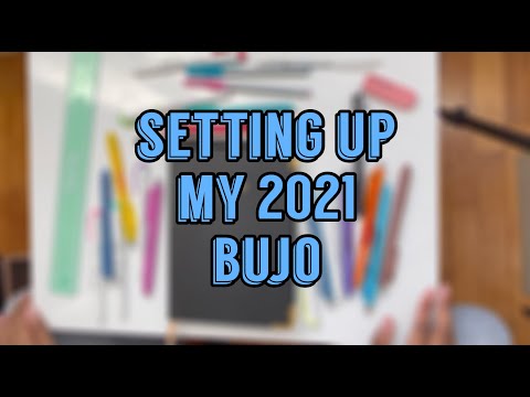 setting up my 2021 bullet journal || vlogmas day fourteen