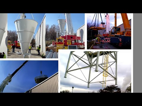 Two Huge Liebherr Telescopic Mobile Cranes work as a tandem to lift a huge cyclone on a roof.