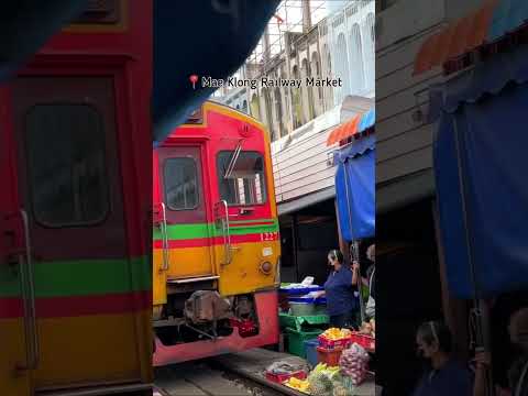 The famous Train market in Thailand - Mae Klong Railway Market near Bangkok