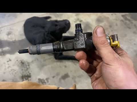 Changing injectors on Cat skid loader