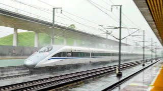 Bullet Train CRH380BL and CRH380AL pass Jingguang Highspeed Railway Qingyuan Station in high speed