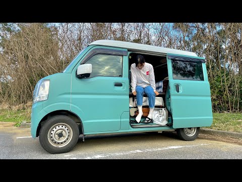 Traveling in a minivan through an old Japanese town.