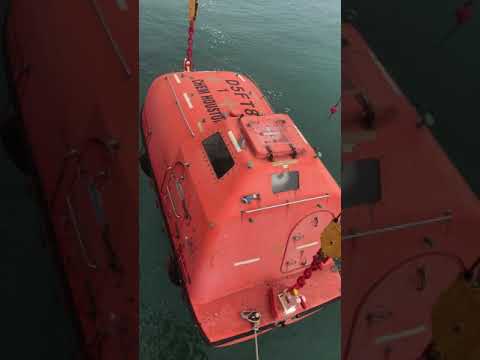 Launching life boat by ship