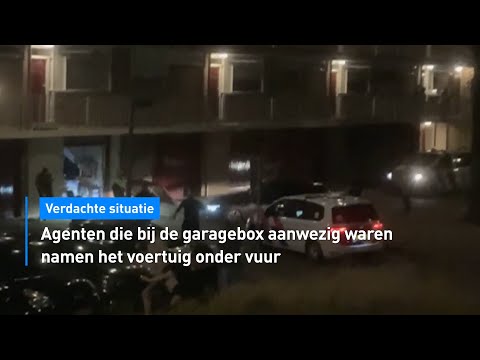 🚘Heftige beelden: agenten vuren kogelregen af op auto die op hoge snelheid uit garagebox scheurt