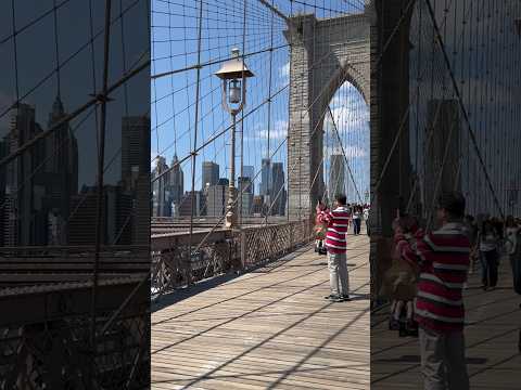 The Iconic Brooklyn Bridge in New York City connects Manhattan and Brooklyn across the East River.