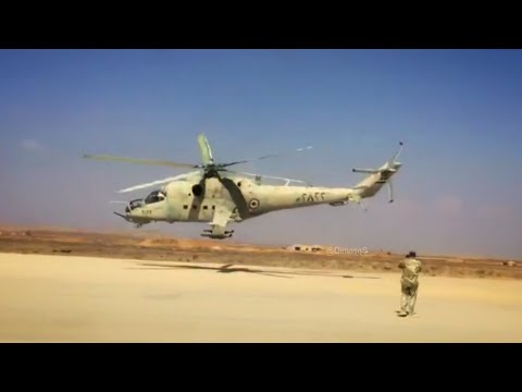 Mi-24 hind of the Syrian Air Force at a very low level flying.