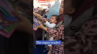 The super reader at our stands during Karachi International Book Fair. #books #education #reading