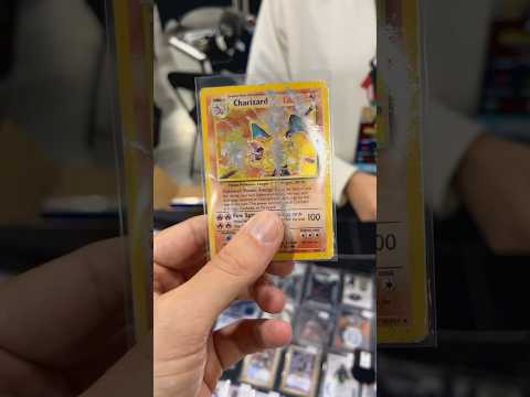 Destroyed Base Set Charizard Pokemon Card Negotiation