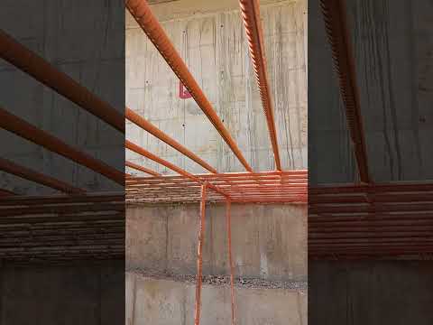 Red Oxide Primer Coating on Steel Bars | Rust Prevention for Construction"