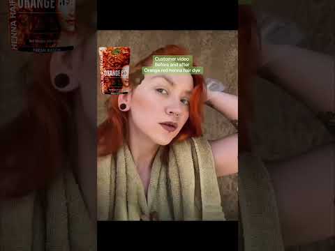 Customer video using orange red henna hair dye