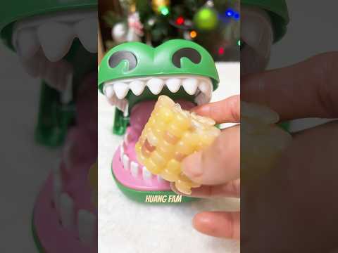 CROCODILE DENTIST EATING STICKY WHITE CORN