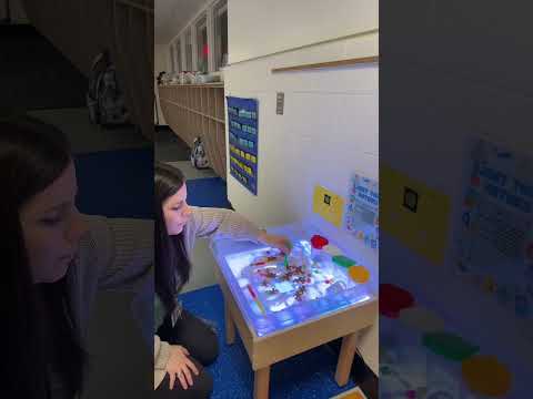 I’ve set up an engaging activity at our light table by adding new winter-colored magnet tiles