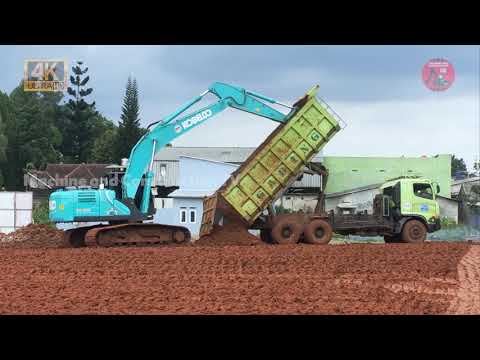 Excavator Dozer Trucks and Vibro Roller Building Road