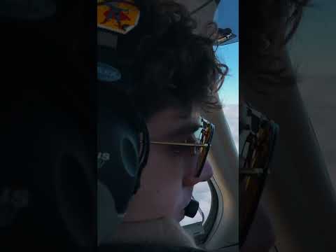 Flying in a small plane over frosted hills #shorts