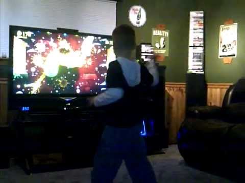 Boy Wonder Playing Fruit Ninja on Xbox 360 Kinect, hilarious reaction at end!