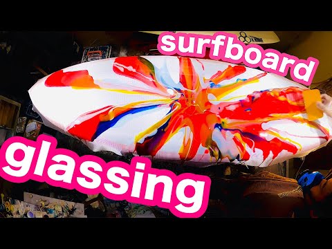 glassing a surfboard in five colors of resin.amazing mix