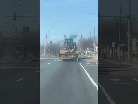 Dancing Crazy Lady Falls Off Wide Load Trailer!