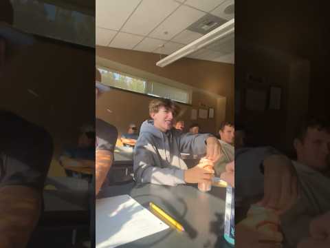 8 people opening soda cans at the same time in class