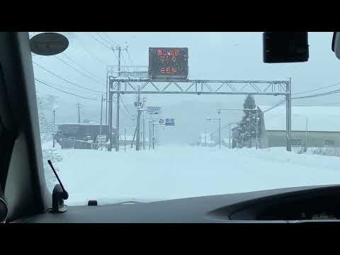 on the way to Hakodate Airport with  December blizzard and white-out in Winter , Hokkaido 2022