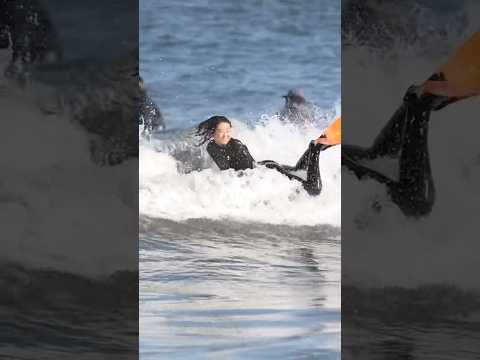 A beautiful surfer found at the beach.