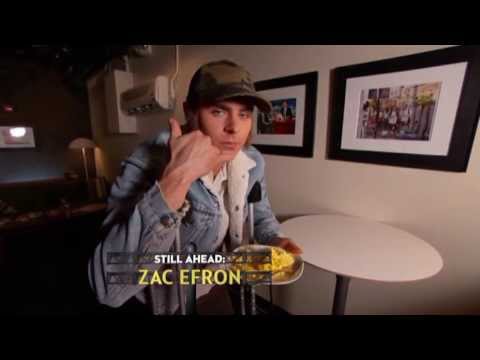 Zac Efron eats and winks