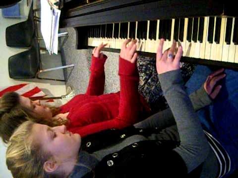 Two girls playing Song