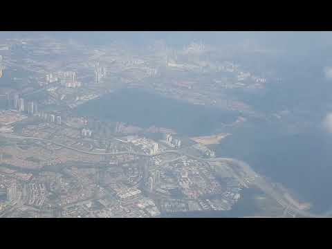 Malaysia Airlines flying over Kota Damansara with Kwasa Damansara MRT and DASH RRIM Toll