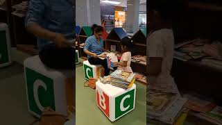 Mommy daughter reading time... #Childrenlibrary #storytimeforkids #readingtime