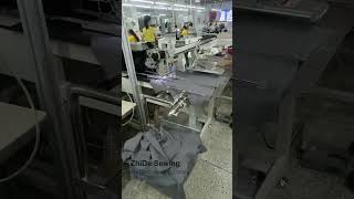 Our automated polo-shirt front placket sewing machine is running in our custoer factory. #autosewing