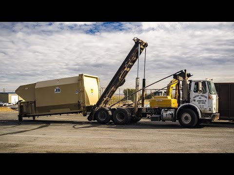 White Xpeditor Roll-Off Garbage Truck