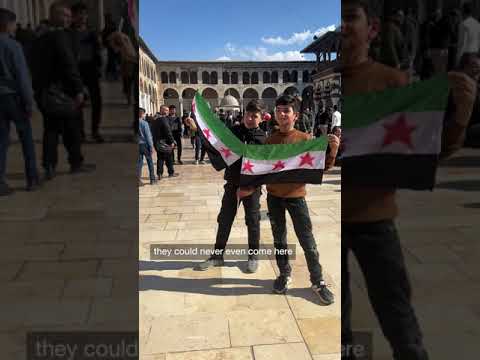 Syrians gather at mosque in Damascus after the collapse of President Bashar al-Assad's government