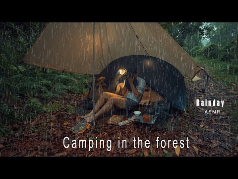 Camping alone in the forest under the rain