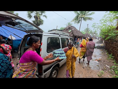 இடை விடாமல் கொட்டும்  கடும் மழையில் முதியோர்களுக்கு போர்வை விநியோகம் நெதர்லாந்து நித்யா அர்ஜுன்