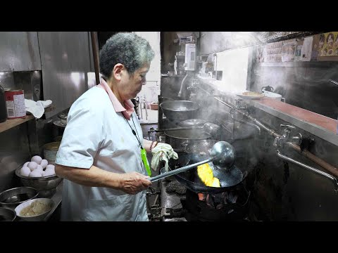 A cafeteria in downtown Japan. Fried rice made by a veteran grandmother