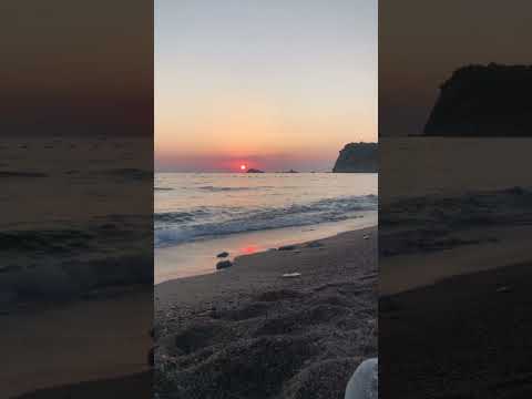 Beautiful sunset view at Buljarica beach in Montenegro filled with relaxing sounds of the sea.